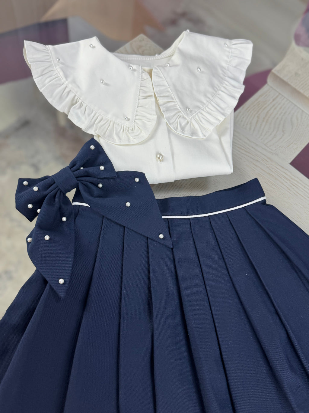Fustă bleumarin de școală cu cute