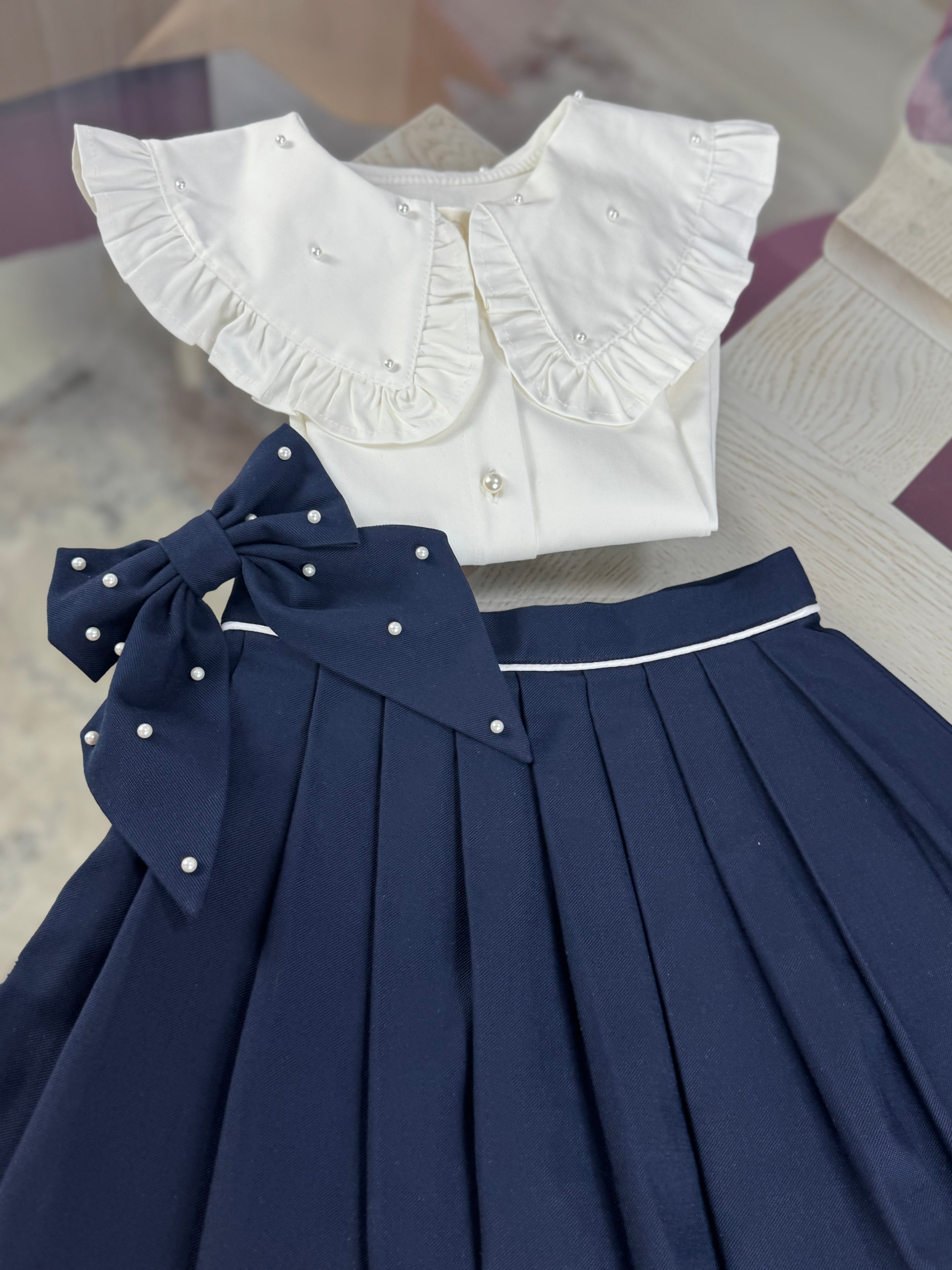 Fustă bleumarin de școală cu cute